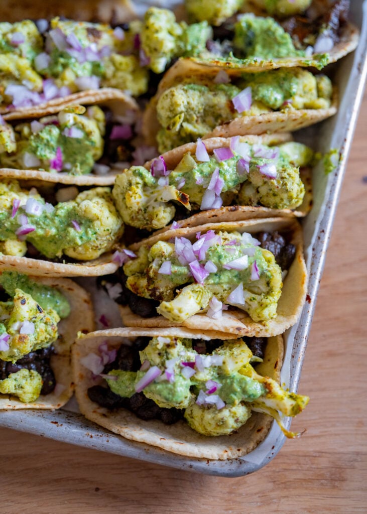 Black bean + cauliflower tacos with creamy chimichurri