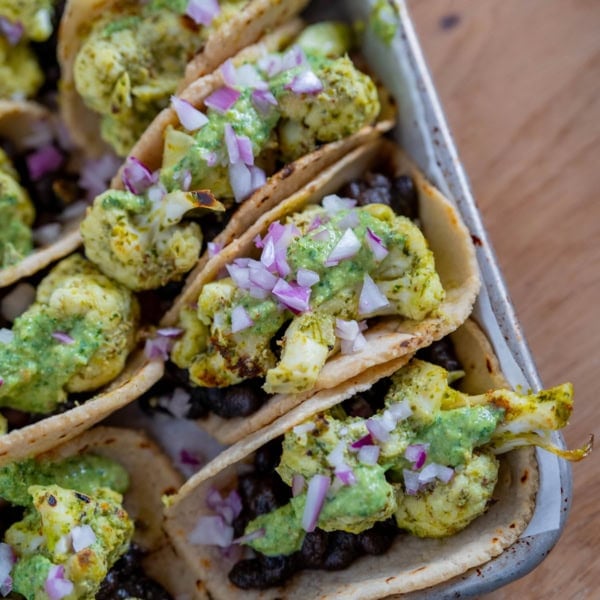Black bean + cauliflower tacos with creamy chimichurri
