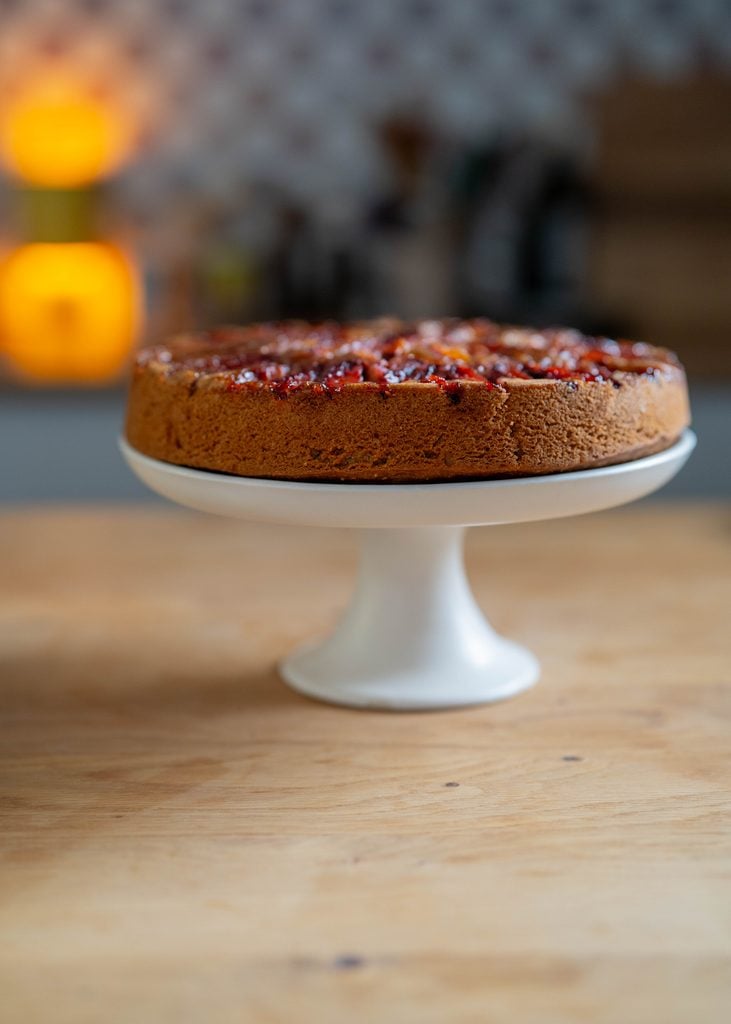 plum cake on cake stand