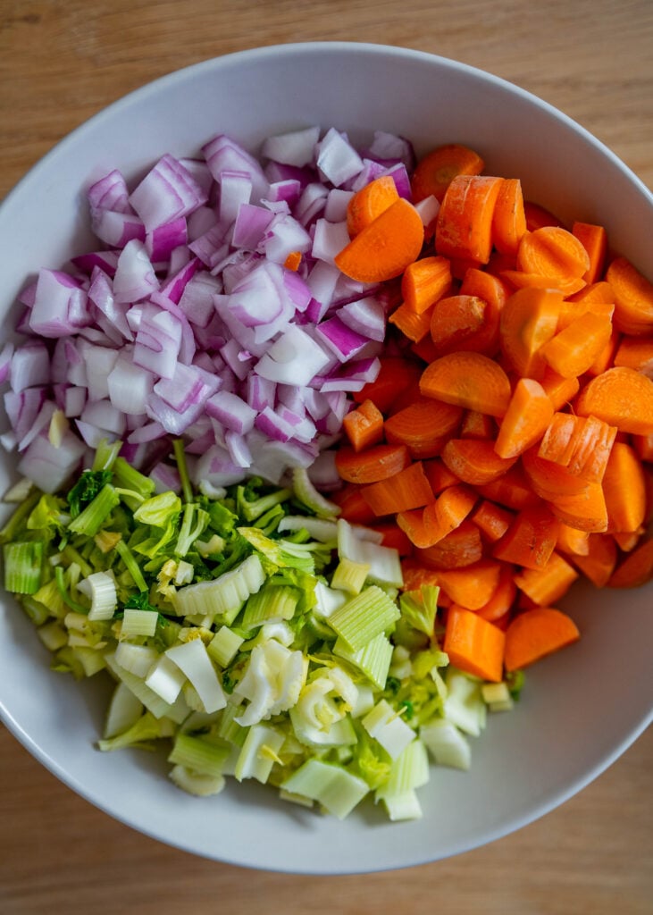 bowl of chopped carrots, celery, red onions