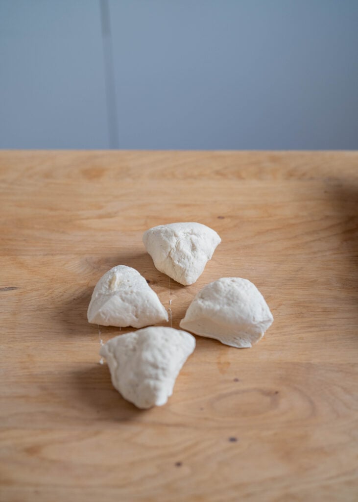 dough ball cut into quarters