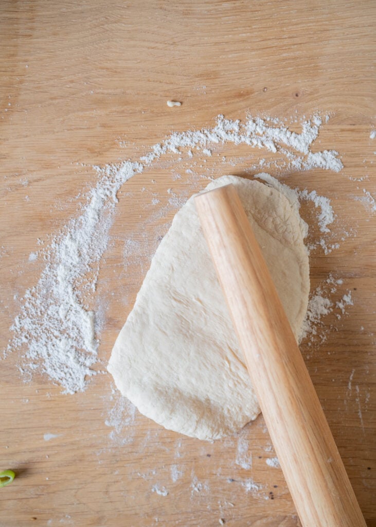 continued flattening of dough