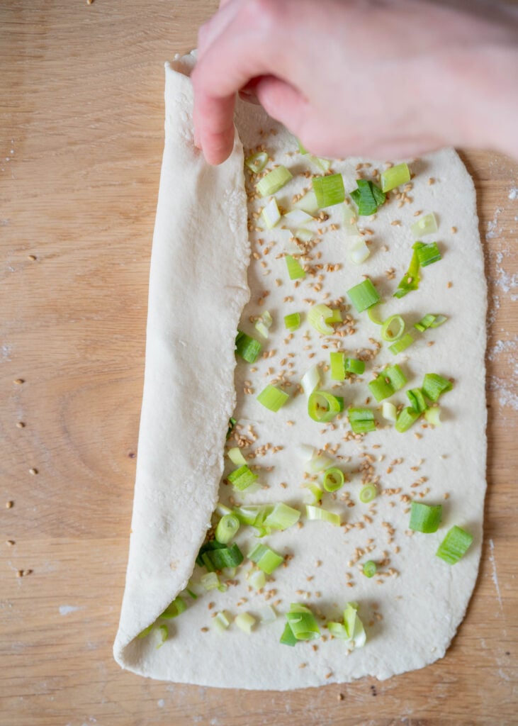 first fold of dough rectangle