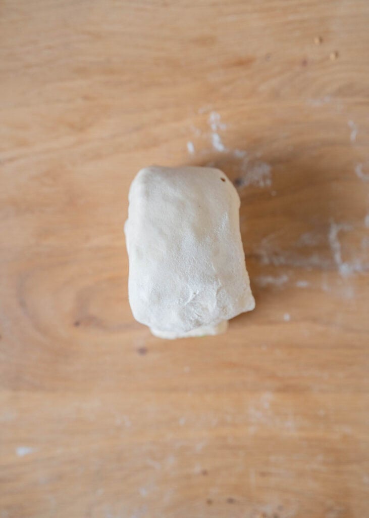 third fold short way of dough layers - dough square