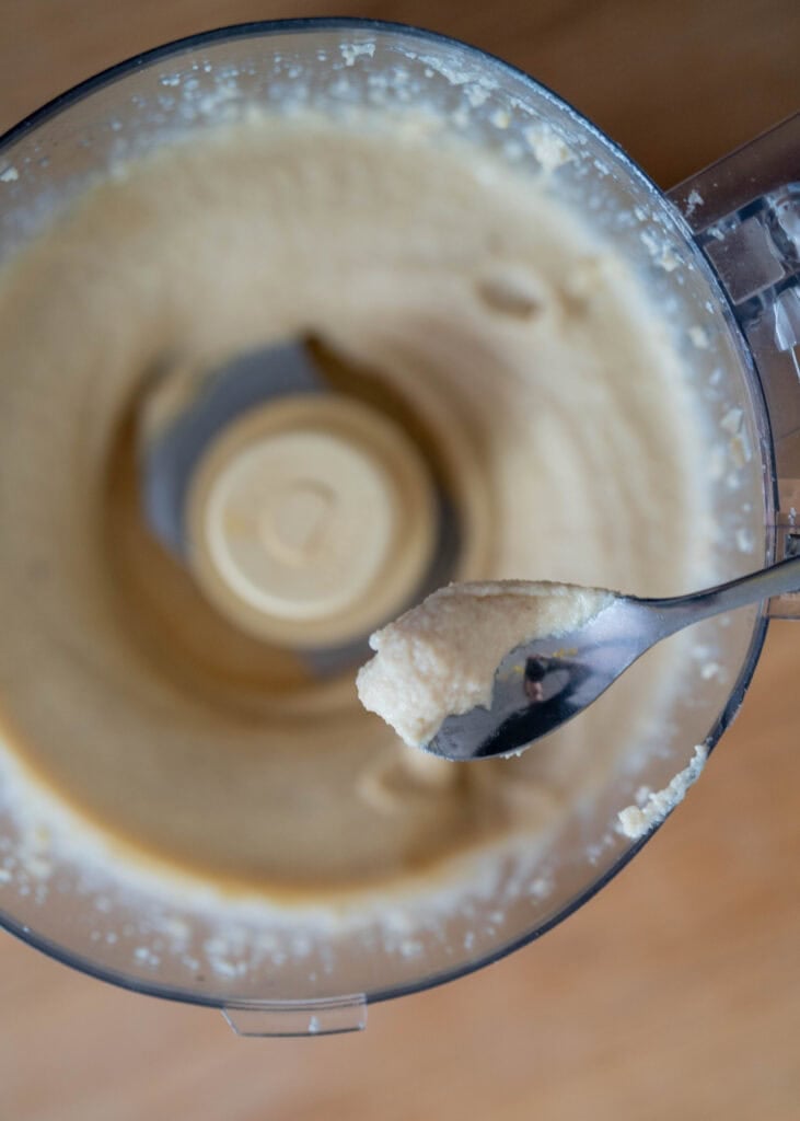 blended cheesecake mixture in food processor