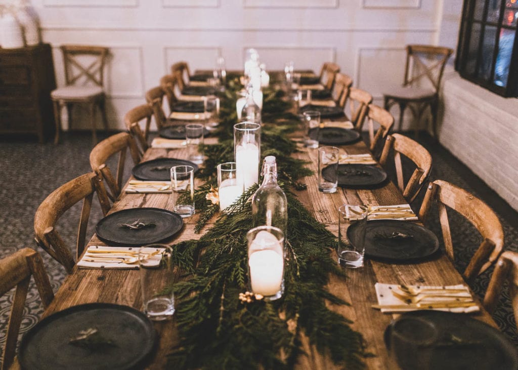 Scrap Supper tablescape using foraged cedar and rosemary by Rachelle Hacmac.