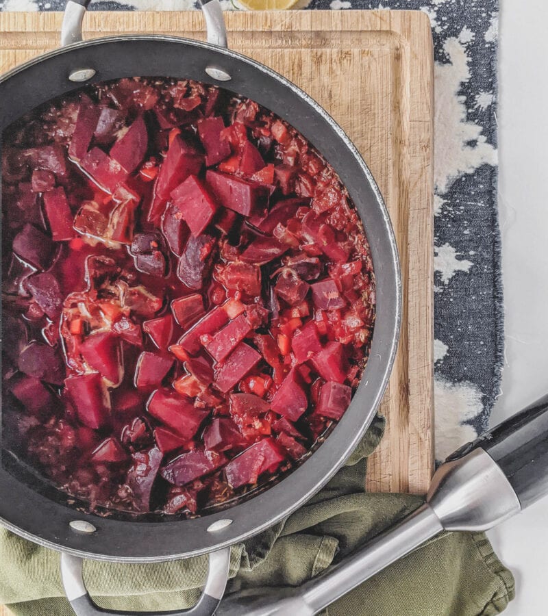 beet root soup being mixed