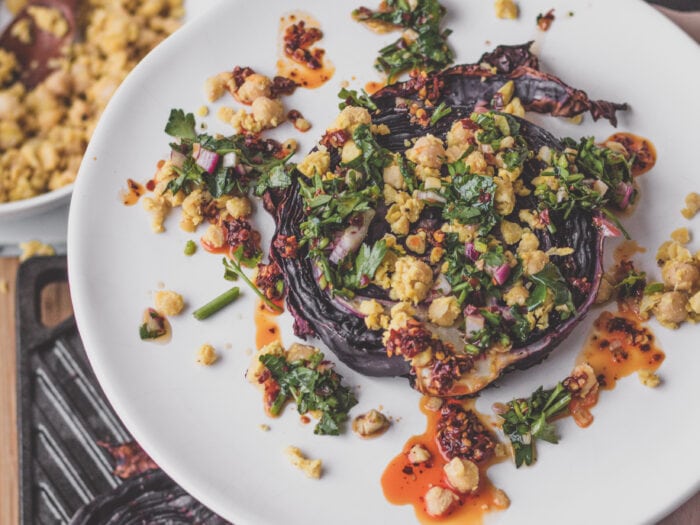 purple cabbage steaks with chimichurri and chickpea crumble