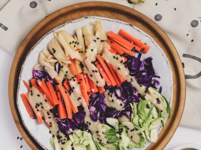 purple cabbage, carrot, apple, brussels sprout slaw with tahini dressing